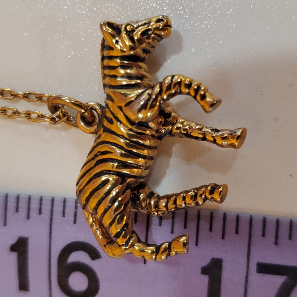 J crew gold toned necklace with horse pendant